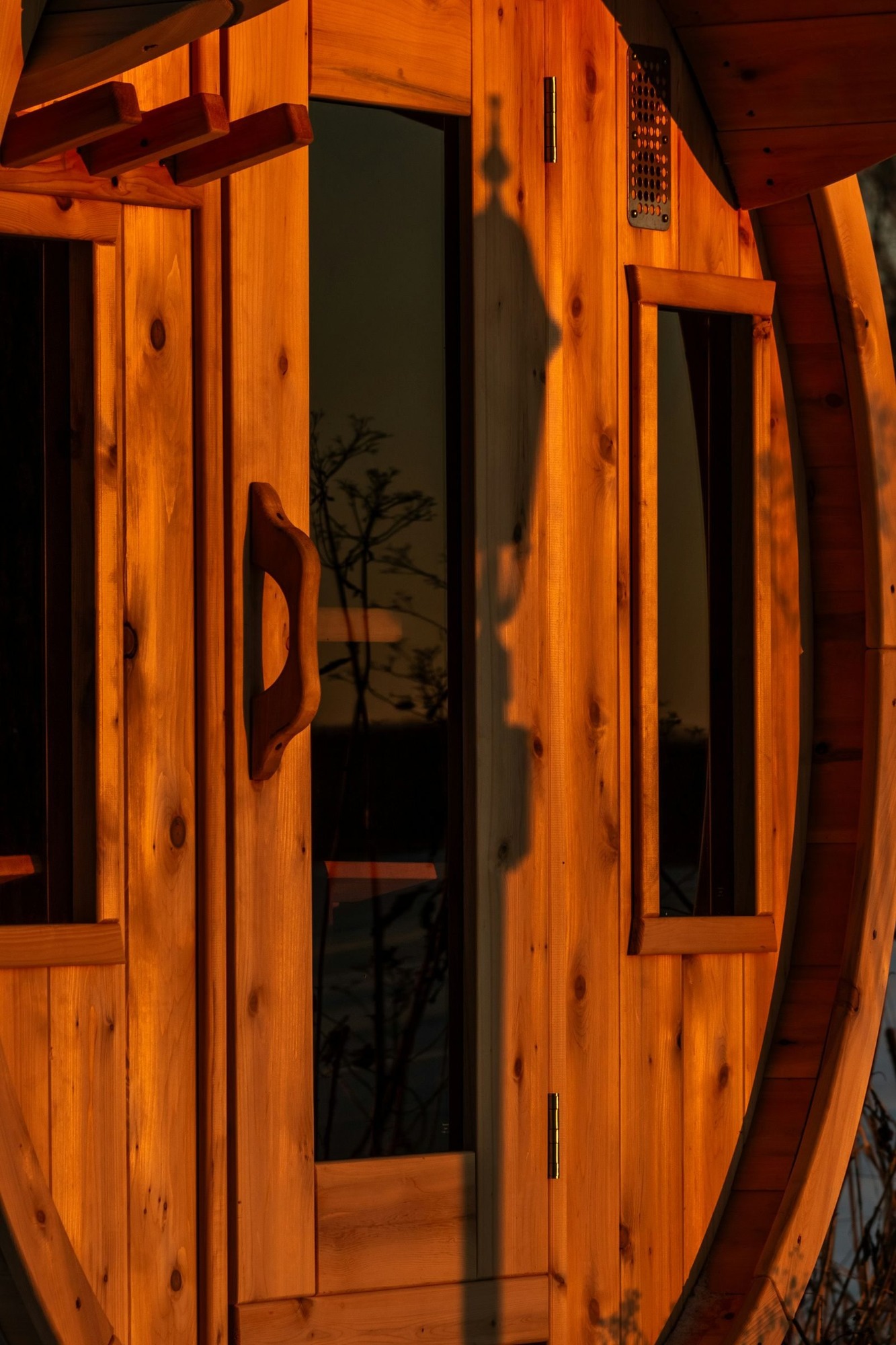 Cedar barrel sauna door and glazing built in Oakland